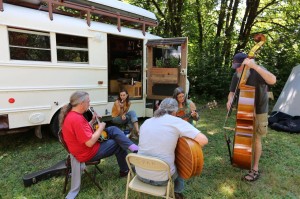 Jam session in front of Edna at music campout.