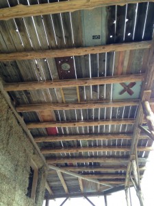 The porch ceiling of the straw bale house I got to decorate with wood, metal, and more.