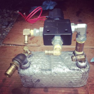 The new 3-way valve for my WVO system (mounted to my 30-plate flat plate heat exchanger).