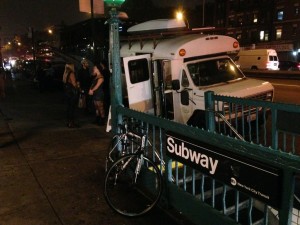 Serving tea outside the subway in front of Elephant Revival's tour bus. 